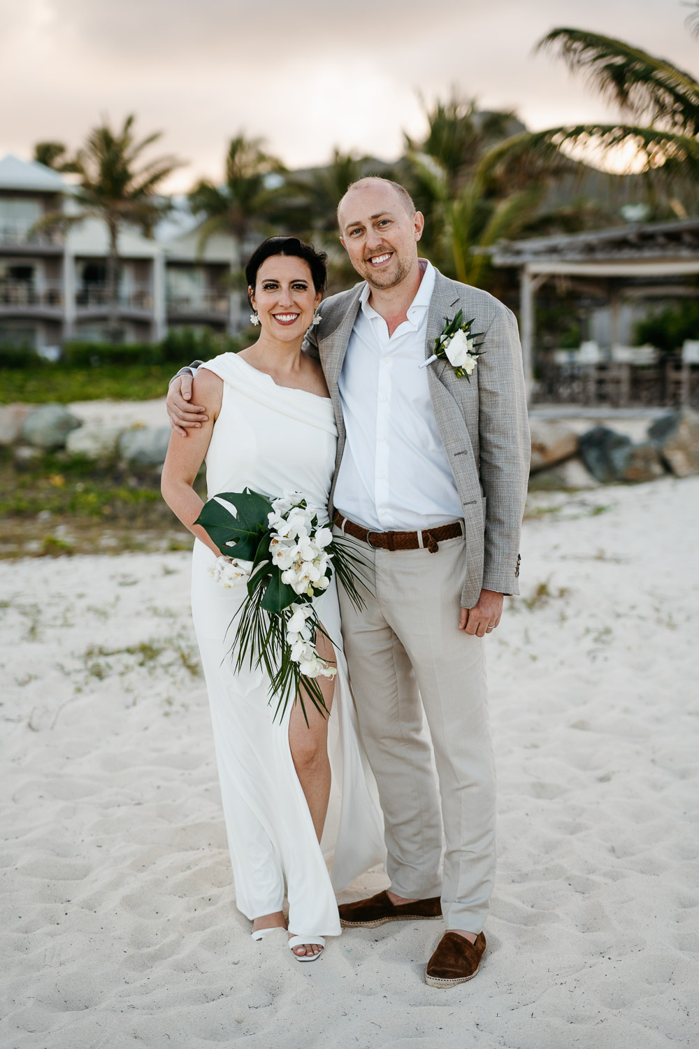 bride and groom posing after wedding ceremony at Orient beach St. Martin